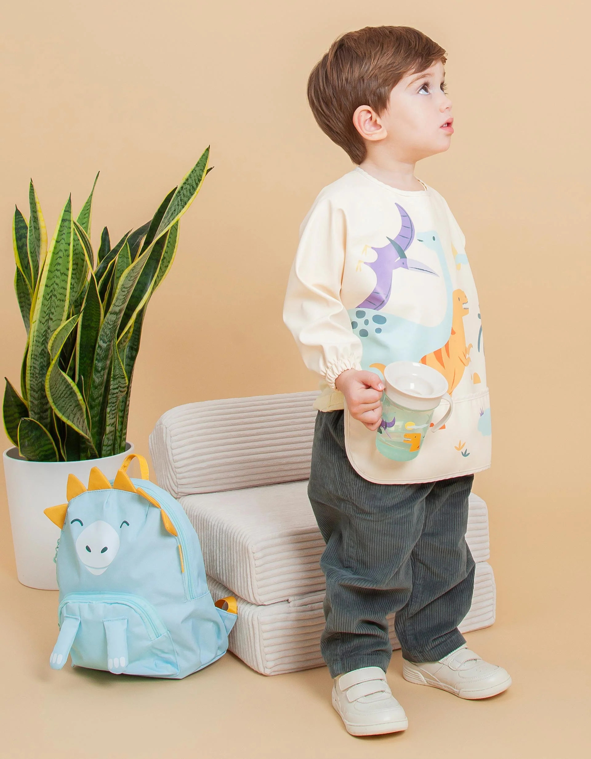 Jurassic Waterproof Soft Bib with Sleeves and Pocket by Miniland - Image 5
